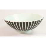 Wedgwood ribbed footed bowl by Norman Wilson: Decorated in light blue and black colours, d.27cm.