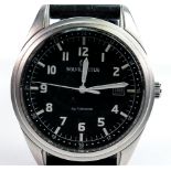 Solvil Et Titus automatic gentlemans wristwatch: Black date dial with rubber strap.