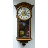 Early 20th century Vienna walnut springer wall clock: h.90 x w.38cm.