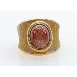 High carat gold ring set cabochon goldstone: Not hallmarked, but tested as 18ct or better, ring size