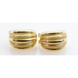 Pair of 18ct gold earrings: Weight 5.9g, stamped .750 and tested as such.