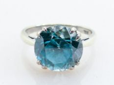 9ct white gold & blue topaz ring: Stamped 9ct and tested as 9ct gold, weight 5.7g, stone measures