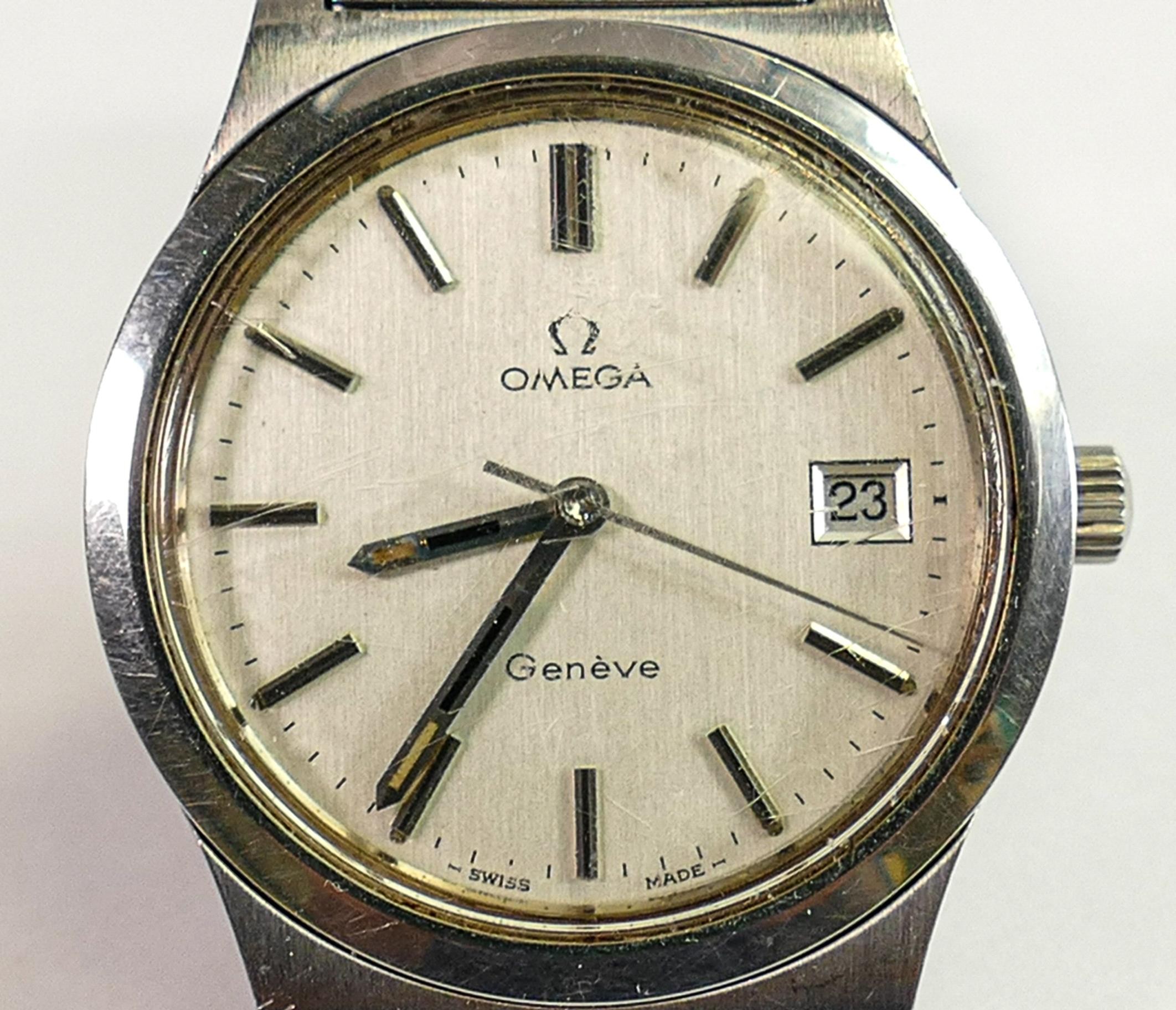 Omega gentlemans Geneve stainless steel wristwatch: Automatic date with Omega steel bracelet.