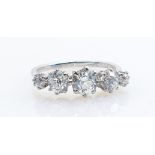 Outstanding 18ct 5 stone diamond ring approx 2ct diamond weight: Center stone 0.75ct / 5.5mm x 4.