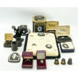 A collection of black Wedgwood jewellery & miniatures to include: Rings, brooches, thimbles,