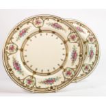 Pair of Wedgwood jewelled cabinet plates with floral decoration: Diameter 27.5cm (2)