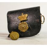 An interesting WWI period leather military ammunition pouch: Bears brass regimental decoration, also