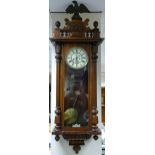 Early 20th century Vienna walnut double weight wall clock: With two brass weights and eagle
