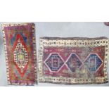 Two oriental rugs with damages: Measuring 191cm x 116cm & 159cm x 100cm.