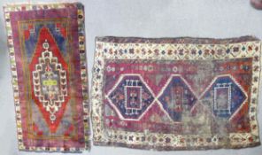Two oriental rugs with damages: Measuring 191cm x 116cm & 159cm x 100cm.
