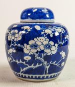 Chinese Prunus decorated ginger jar with 4 character mark: Stands 15cm high.