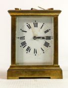 Larger deep brass cased carriage clock timepiece: Measures 16.5cm including handle. Not working.