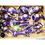 A collection of Limoges gold on cobalt blue items: vases, figures etc (1 tray).