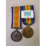 Pair of WW1 war medals: issued to Gnr. F H Cloke, original ribbons attached.