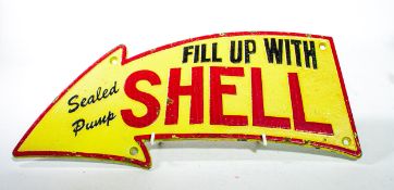A Cast Iron Shell Curved Arrow Fuel Wall Plaque