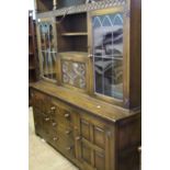 Dark oak Priory style sideboard with illuminated display cabinet top, 168cm W x 200cm H.