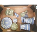 A collection of Wedgwood jasperware items: lidded pots, pair of flared vases, salt and pepper etc (1