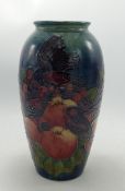 Large Moorcroft finch and berries vase: on blue background. Height 25cm