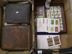 A mixed collection of items to include: framed tea cards, matchbook collection in binder,