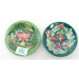 Moorcroft Leicester coaster: together with a coaster decorated with pink orchid (2)