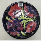 Moorcroft larger plate in the New Anemone pattern: Measures 26cm wide. Light localised crazing to