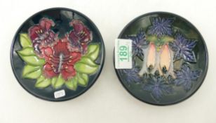 Moorcroft Cluny coaster: together with a floral decorated coaster (2)