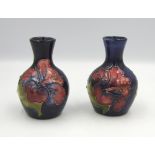 A pair of Hibiscus on blue small vases: Height 9.5cm