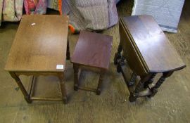 Three carved oak occasional tables: one with barley twist legs.