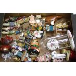 A mixed collection of ceramic and resin items: continental figures, Russian Doll set etc (1 tray).