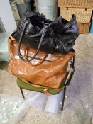 A collection of leather bags to include: large Gladstone type bag, leather satchels, holdall etc (