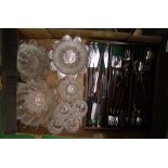 A collection of Dartington crystal Daisy design fruit bowls, candle holders, dessert bowls, butter