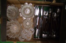 A collection of Dartington crystal Daisy design fruit bowls, candle holders, dessert bowls, butter