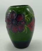 Moorcroft Anemone vase: on green background. Height 18cm