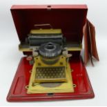 Junior Branded Germany Made Tinplate Toy Typewriter, length 23cm