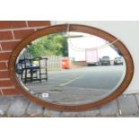 oak framed oval wall mirror