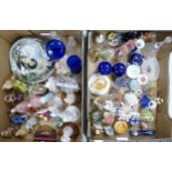 A extensive collection of pottery and glassware: including pottery figurines, glass paperweights and