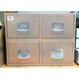 small metal bank of drawers