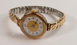 9ct gold ladies wristwatch with gold plated expandable strap.