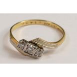 18ct yellow gold 3 stone diamond ring set in platinum. Size P, weight 2.5g.