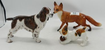 Beswick large standing fox: together with a Royal Doulton stter and a dog playing (3)
