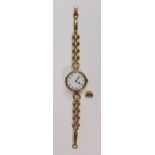 Victorian 9ct gold ladies wristwatch: with 9ct gold bracelet, overall weight 23.6g.