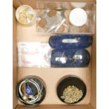 A mixed collection of items to include rimless reading glasses, vintage coins & currency, watches,