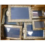 A collection of Silver photo frames in various shapes and sizes (7)