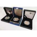 A collection of Royal Mint silver proof £5 coins: comprising 2012 Queens Diamond Jubilee, 2009 Henry