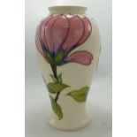Moorcroft Magnolia vase: on cream background. Height 26cm