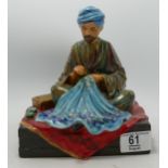 Reg Johnson embroiderer of Kashmir figurine: