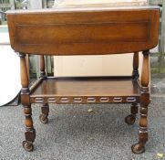 An Oak dropleaf table on Wheels/castors 74cm High 67cm Wide