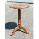 A victorian style Oak Tripod wine table. H: 58cm