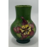 Moorcroft Columbine on Green Ground Vase: Queen Mary Sticker Noted, height 10.5