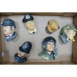 A collection of W H Bossons Wall Masks including USAF Fighter Pilot Desert Storm, Victorian Bobby,